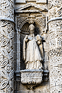 San Agustín de Hipona, en la hornacina superior derecha entre las columnas de orden gigantes (Portada Principal de la Iglesia de San Miguel)
