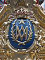 Escudo de una esquina de la canastilla del Paso de la Entrada Triunfal en Jerusalén