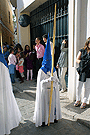 Nazareno con palma de la Hermandad de Cristo Rey en su Triunfal Entrada en Jerusalén