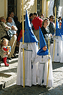 Nazarenos del cortejo del paso de Misterio de la Hermandad de Cristo Rey en su Triunfal Entrada en Jerusalén