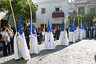 Nazarenos del cortejo del paso de Misterio de la Hermandad de Cristo Rey en su Triunfal Entrada en Jerusalén