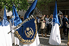 Nazarenos con bocinas de la Hermandad de Cristo Rey en su Triunfal Entrada en Jerusalén