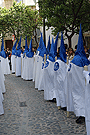 Nazarenos del cortejo del paso de Palio de la Hermandad de Cristo Rey en su Triunfal Entrada en Jerusalén