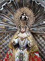 La Virgen de los Remedios, en un lateral de los respiraderos del Paso de Palio de Madre de Dios de la Misericordia