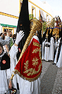 Nazareno portando bocina de la Hermandad de la Coronación de Espinas