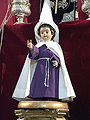 Niño Jesús con la antigua túnica de la Hermandad del Loreto